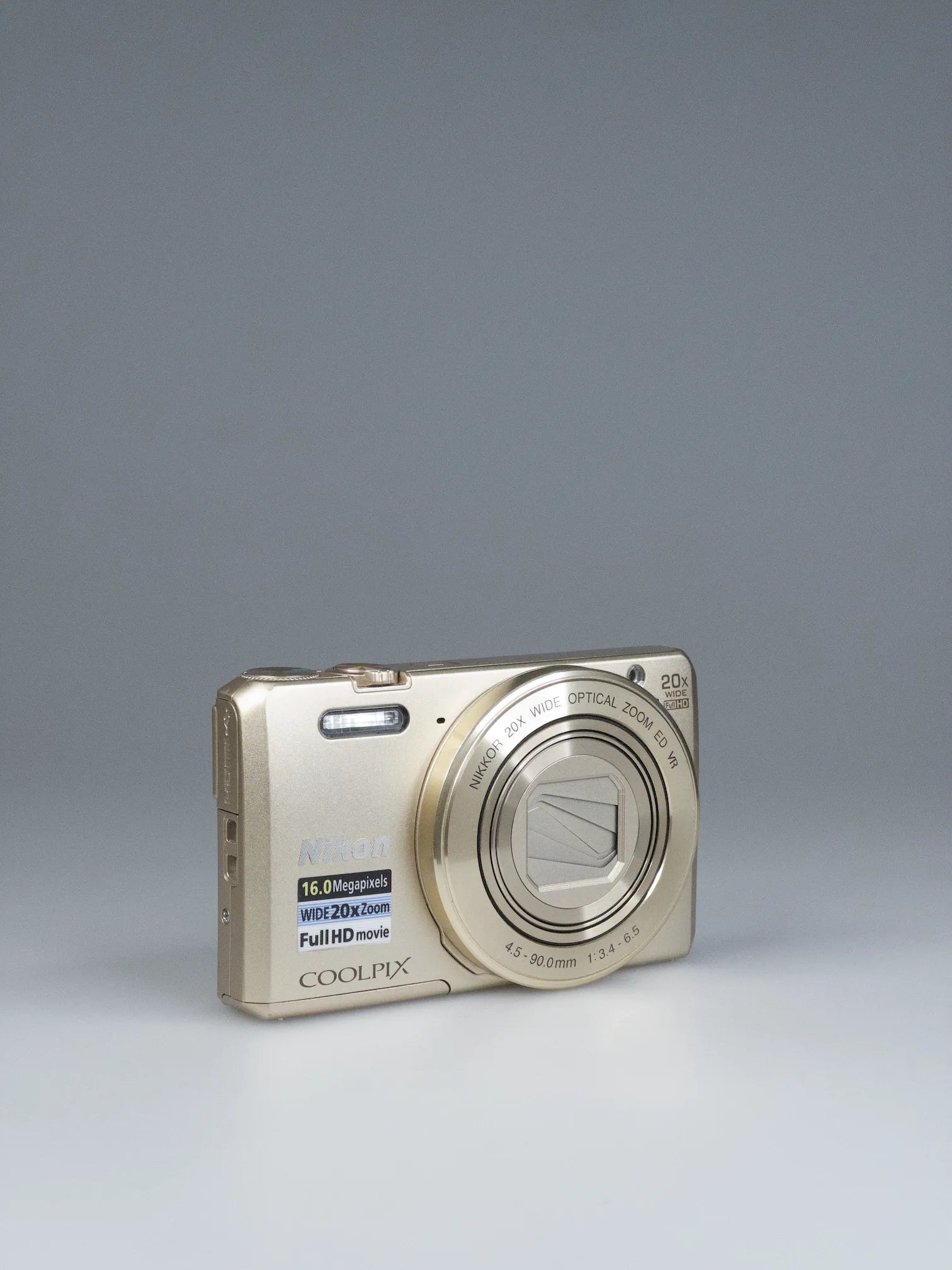 Nikon Coolpix S7000 00s Digicam | Gold 20MP WiFi Compact – Bling Inc.